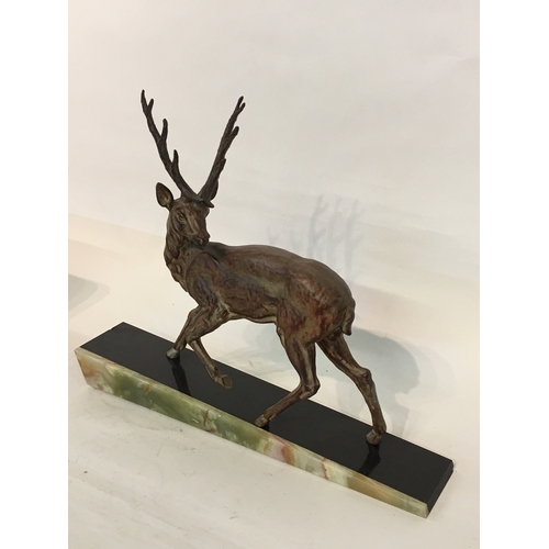 249 - Bronze Style Deer Mounted On A onyx Base Measures 47x10x 40cm