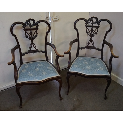 60 - Two carved chairs 98cm x 48cm x 62cm