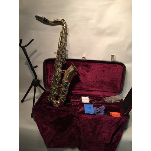 160 - Boosey And Hawkes Saxophone In  Case Along With A Stand And Various Accessories