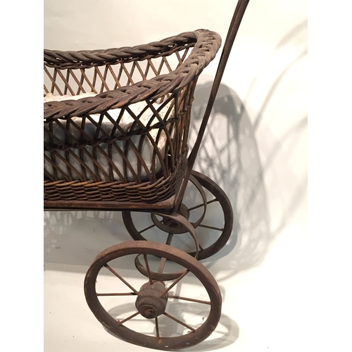 212 - Antique Childs Pram Of Metal And Wicker Construction With 3 Wheels