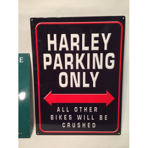 309 - Two metal signs one harley parking only and jaguar E type sign both measuring 30cm x 40cm