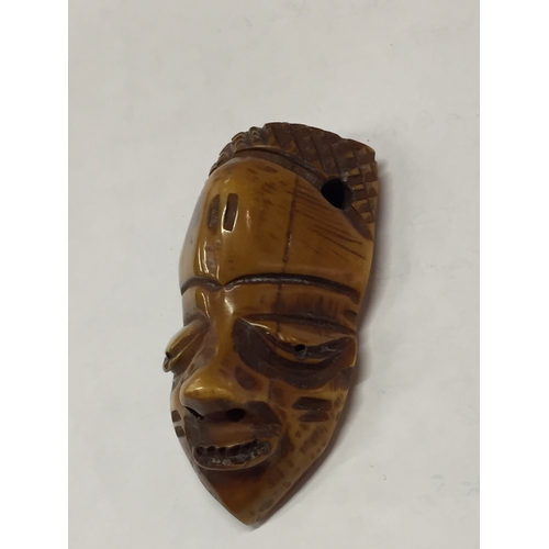 139 - Tribal Art Bone Carved Pendant