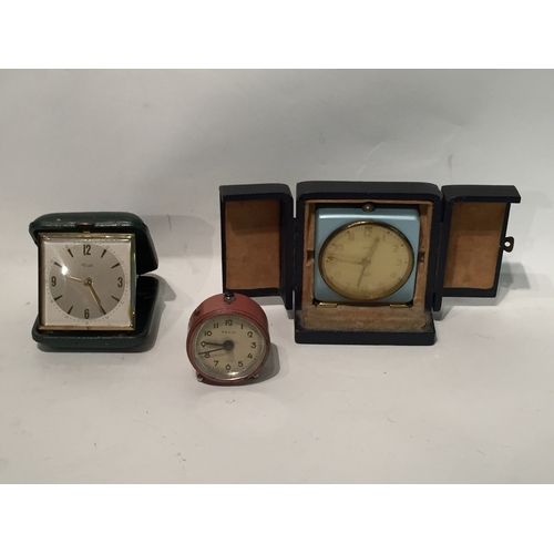 234 - Three vintage travel clocks