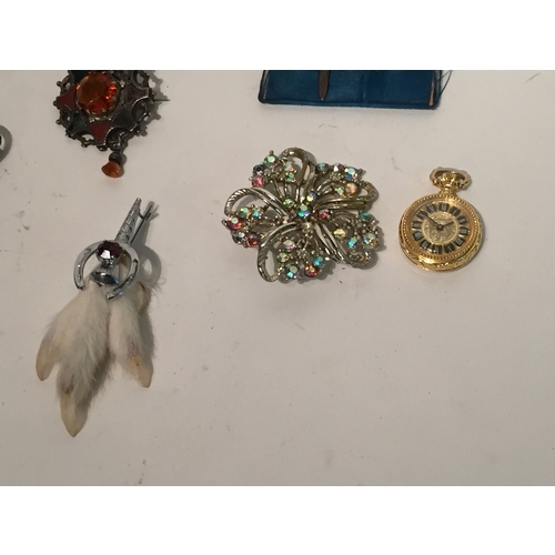 141 - Various items to include silver hairpin , silver topped glass jar , brooches etc