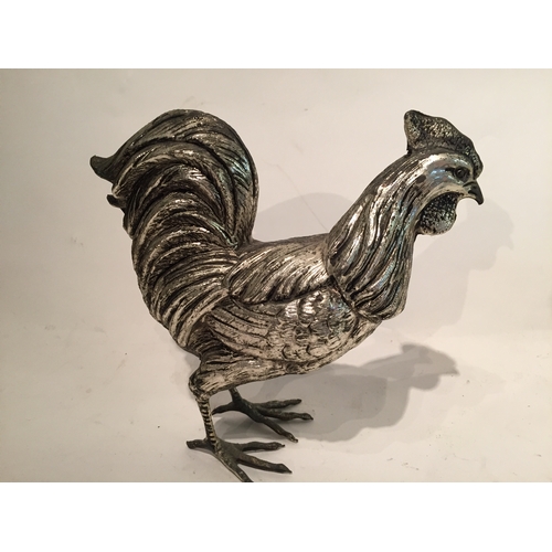 277 - Pair silver coloured Metal chickens 18cm