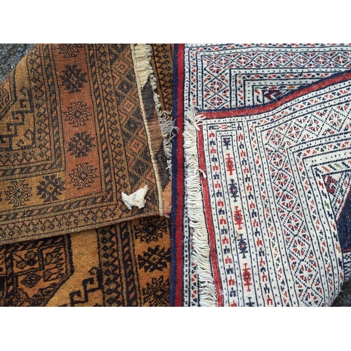 67 - 2 x carpets one measuring 120cm x 79cm the other at 111cm x 72cm