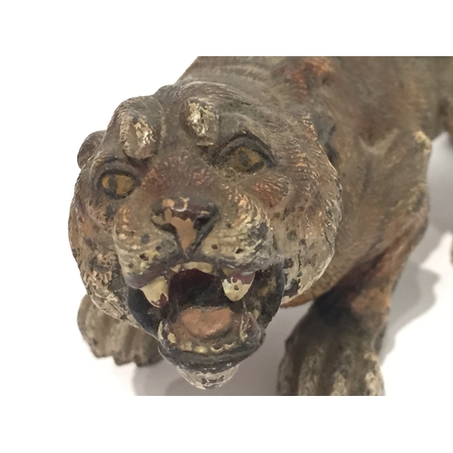 106 - AN AUSTRIAN COLD-PAINTED BRONZE MODEL OF A TIGER 
CIRCA 1900, IN THE MANNER OF BERGMAN OF VIENNA
