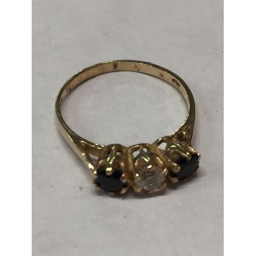 124 - 3 Stone 9ct gold ring