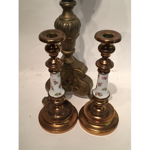 274 - Brass Pricket Candlestick stands 66cms high Along With A Pair Of Brass And Ceramic Candlesticks