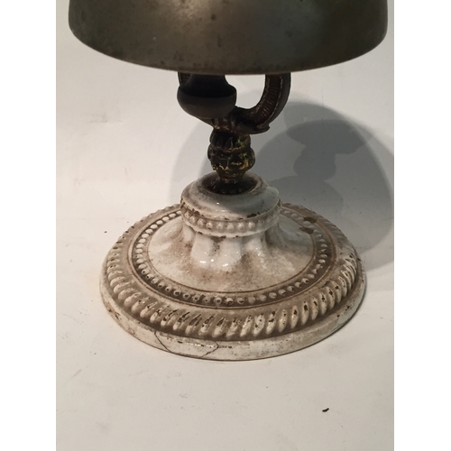 425 - Antique ceramic based counter bell 14.5 cm high