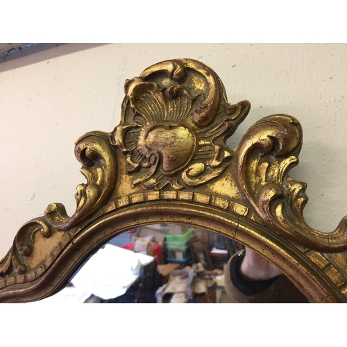 74 - Gilt frame mirror 42cm x 75cm