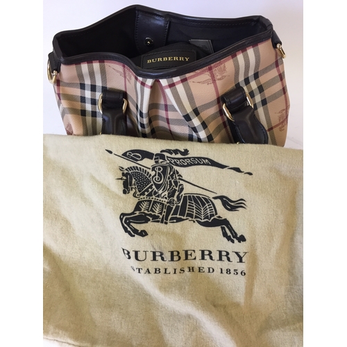 113 - Collectable Designer Burberry handbag In Almost Unused Condition