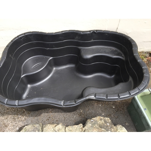 34A - Plastic pond ground insert along with faux stone water fall and pond 6000/12000 water filter