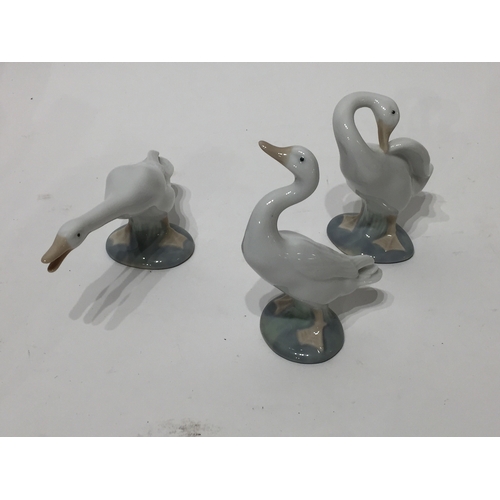 165 - Lladro Geese X 3  tallest being 12cm tall