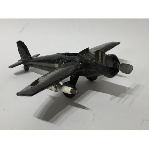 180 - Folk art metal  Plane