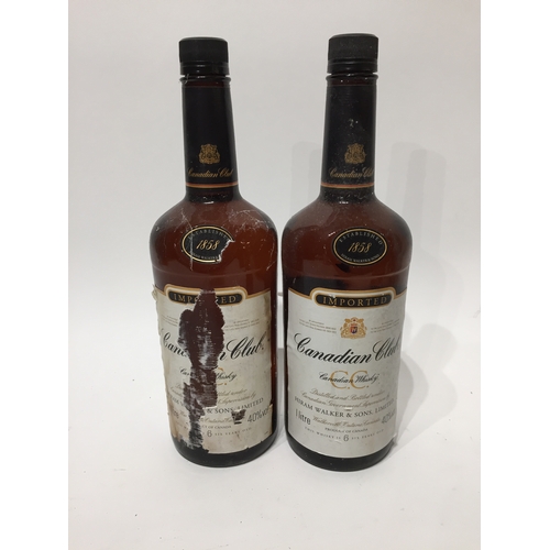 197 - 2 x 1 litre bottles of Canadian club whiskey