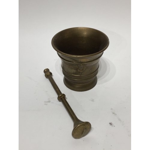 212 - Brass pestal and mortar 11cm diameter