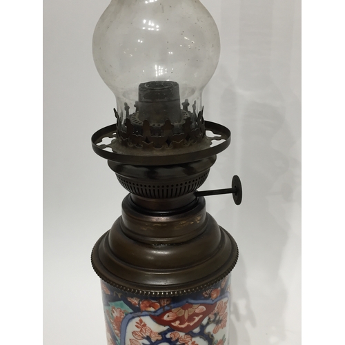 136 - Vintage Oil lamp with ceramic base 50cm tall