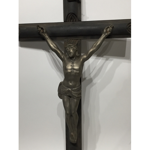 105 - Large metal corpus christi on wooden cross 80cm tall