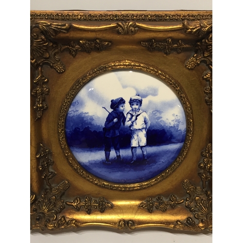 248 - 2 x Gilt frame ceramic tiles in gilt frame 29.5cm x 29.5cm