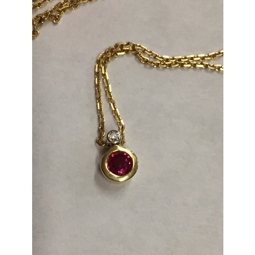 307 - 18ct gold diamond and ruby necklace