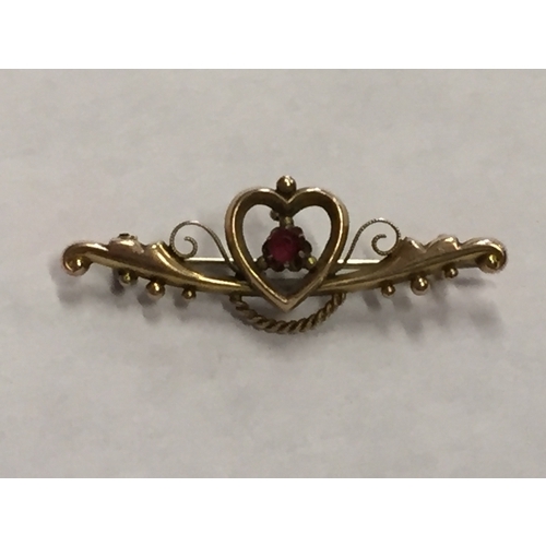 313 - 9ct gold heart shaped brooch