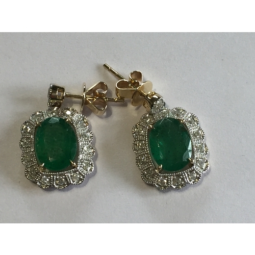 279 - 14 ct Yellow Gold Diamond And  Emerald Earrings .With 2 Emeralds Along With 30 Round Brilliant Cut D... 