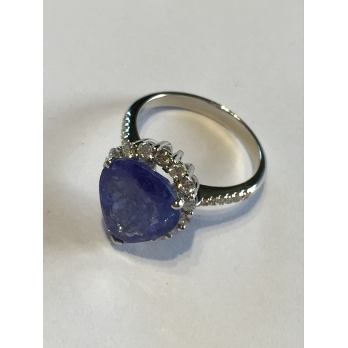 288 - 14 ct White Gold Tanzanite  And Diamond Ring,With One Pear Cut Natural Tanzanite 4.69ct  With 28 Rou... 