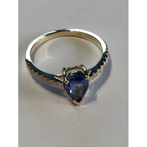 291 - 14 Ct Yellow Gold Sapphire And Diamond Ring.Featuring One Pear Cut Natural Sapphire  Along With 16 R... 