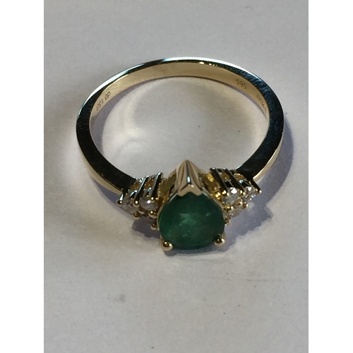 292 - 14 Ct Yellow Gold Emerald  And Diamond Ring.Featuring One Pear Cut Natural Emerald   Along With 6 Ro... 