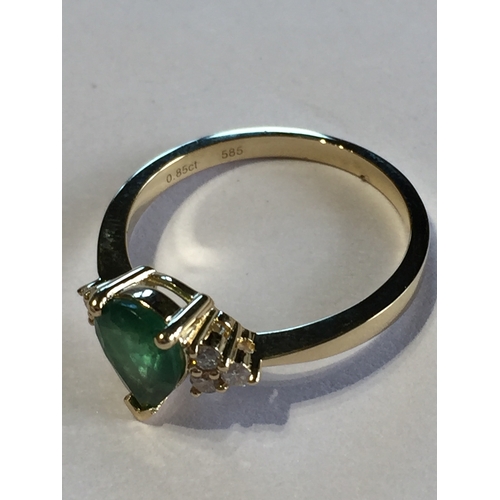 292 - 14 Ct Yellow Gold Emerald  And Diamond Ring.Featuring One Pear Cut Natural Emerald   Along With 6 Ro... 