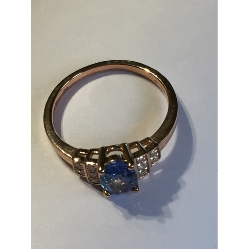 295 - 14 Ct Rose Gold Sapphire And Diamond Ring.Featuring Oval  Cut Natural Sapphire  Along With 10 Round ... 