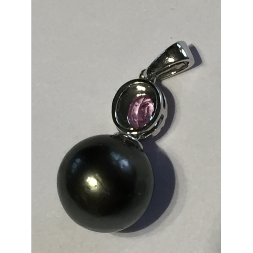 301 - 14 Ct White Gold Pearl And Sapphire Pendant.Featuring One Tahitian Pearl And One  Natural Pink Sapph... 