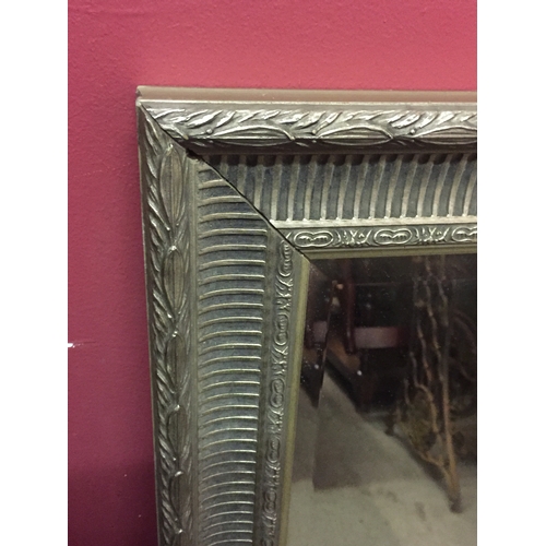 397 - Silver Wood Framed Mirror. 107 x 91 cms