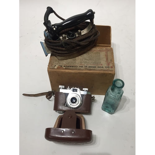 402 - Vintage Boxed Iron Along With A Halina Camera And A Bottle