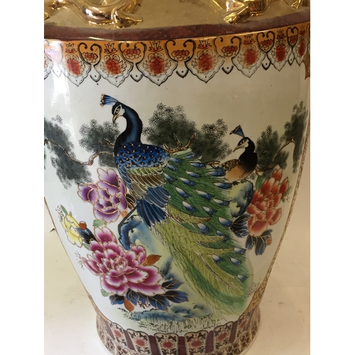 90 - Large ceramic chinese vase with gilt bird handles and hand painted peacock and other bird decoration... 