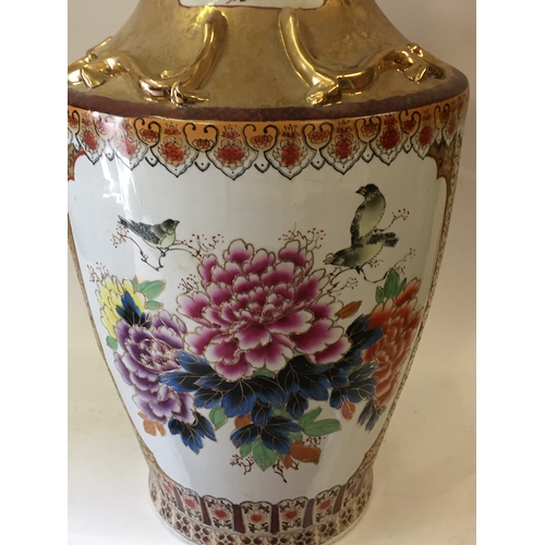 90 - Large ceramic chinese vase with gilt bird handles and hand painted peacock and other bird decoration... 