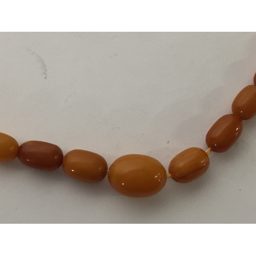 120 - A string of beads Possibly Amber