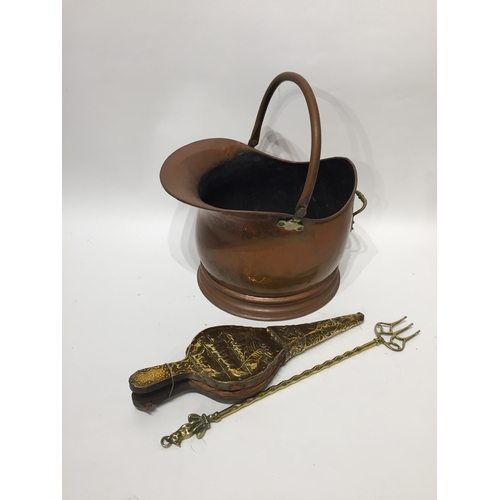 206 - A copper coal bucket along with bellows and a fork