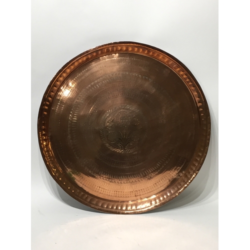 208 - A good quality copper tray 58cms diameter