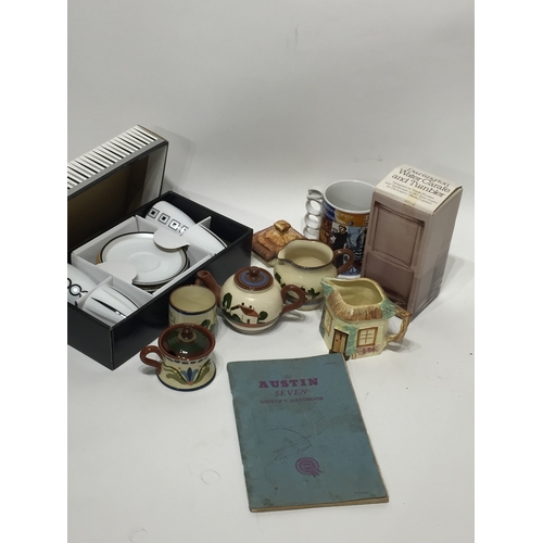 214 - Torquay ware various other chinaware along with a Austin 7 drivers handbook