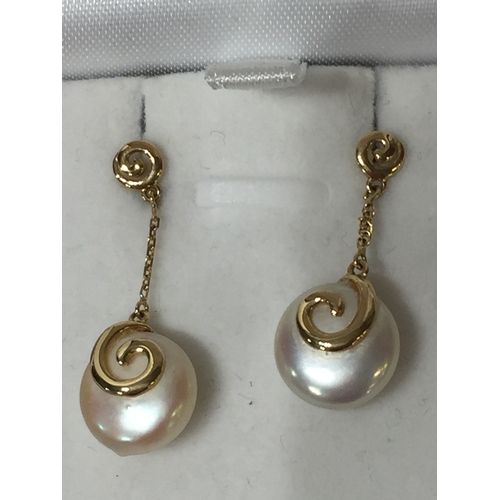 124 - Pair Of Gold Pearl Earrings.