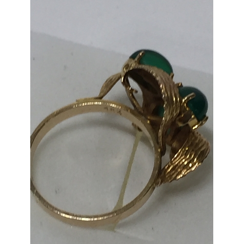 144 - 18 k Jade Style Stone Ring Size O