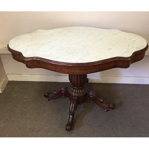 15 - Marble topped table 69cm x 112cm x 74cm