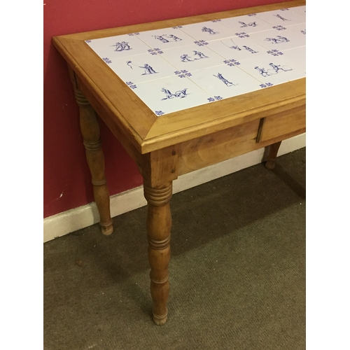 27 - Tiled Top Table With Dutch Tile Inserts And Front Drawer.92 x 53 x 73 cms