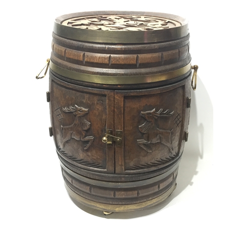 36 - Carved Wood Barrel In The Form Of A Drinks Cabinet 61 cms High