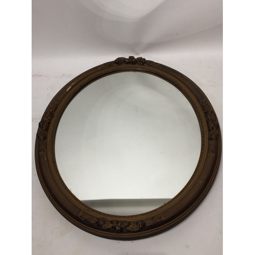 79 - Vintage oval framed mirror 59x49cms