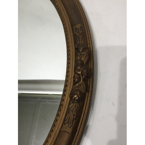 79 - Vintage oval framed mirror 59x49cms