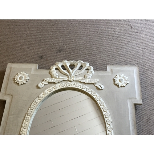 93 - A wood framed shabby chic french carved wood mirror measures 103x83cms