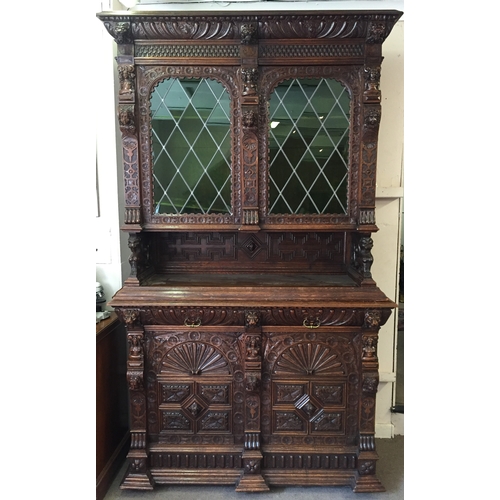 50 - Profusely Carved French Two Piece Hunt Cabinet 256 cms High X 153 X 57